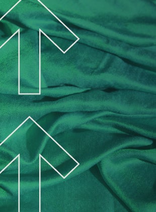 Green fabric with two up arrows over it