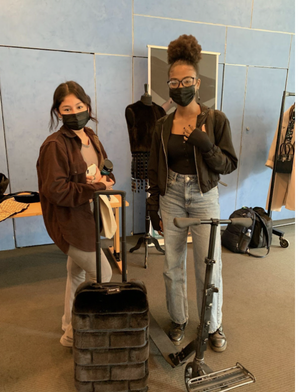 Evelyn Giron and Aniyah James pictured with  Romeo Hunte’s Blackglama Suitcase and scooter