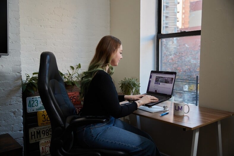 woman with red hair on laptop, LIM mug