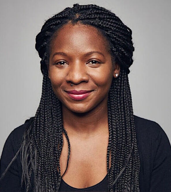 woman, long dark hair, black shirt, professional headshot