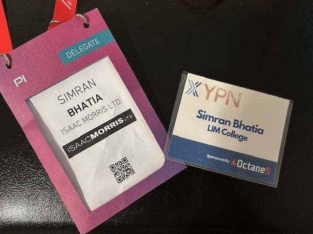 Simran event badges, red lanyard