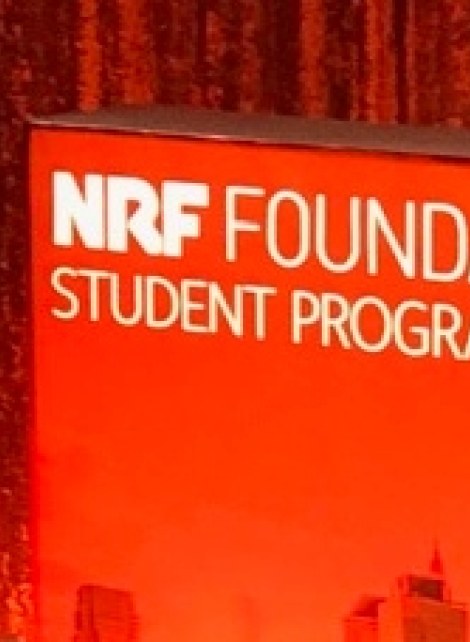 NRF big show red backdrop