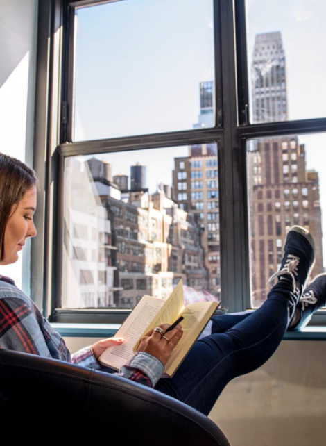 woman studying in New Yorker
