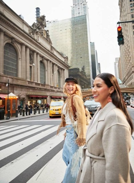 students crossing street midtown, Chrysler Building in background