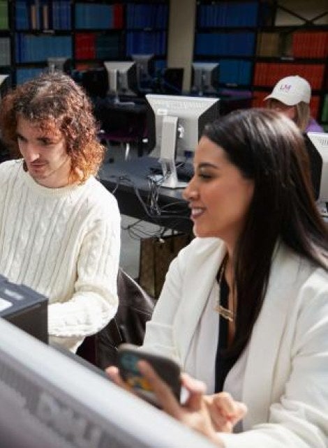 two students in computer lounge