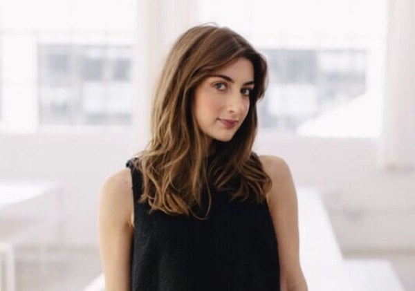 Lauren Gallo leaning on white table