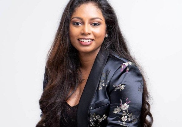 Mahesha DeSilva professional headshot, medium shot
