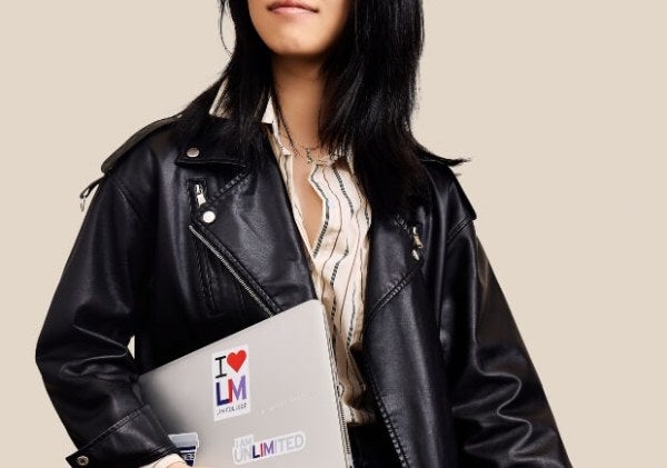 Anjing, black leather jacket, LIM laptop, medium shot