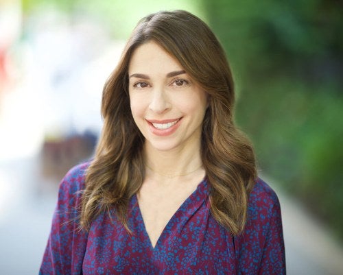 headshot of a woman outside