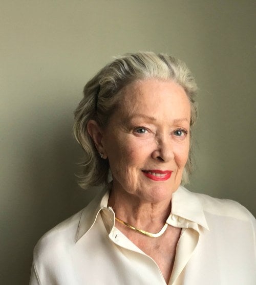 photo of a woman in front of gray background