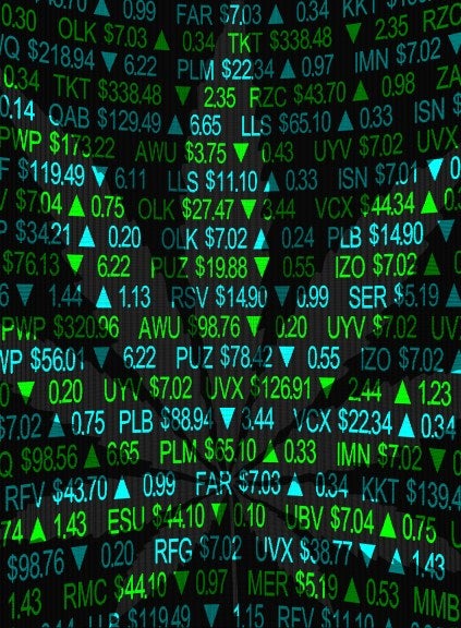 cannabis leaf design over a stock exchange ticker.