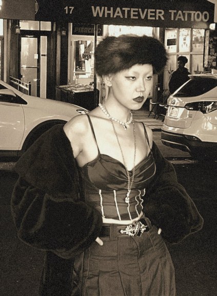 Kimber Yang modeling shot, black and white photo, fur hat and coat