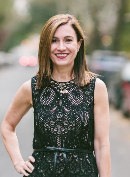 Michele Parsons in black, sleeveless dress