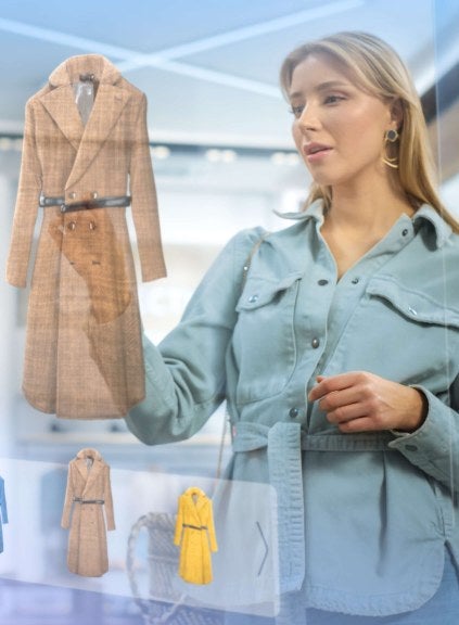 woman using holographic touchscreen