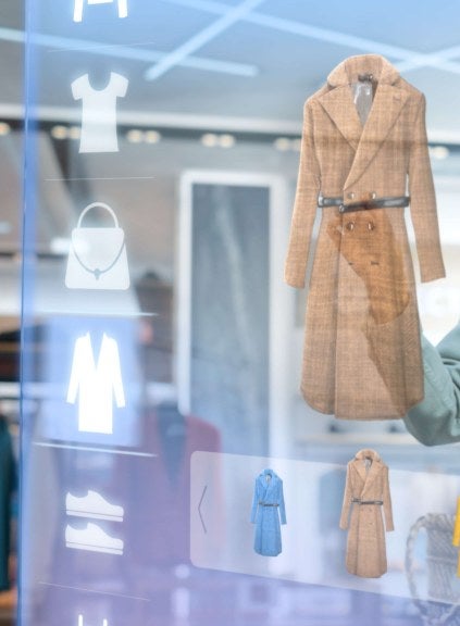 woman using holographic touchscreen