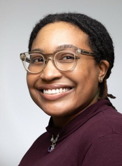 woman, glasses, smiling, professional headshot