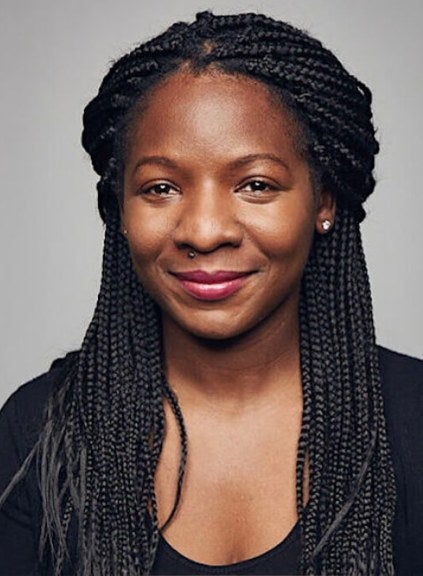 woman, long dark hair, black shirt, professional headshot
