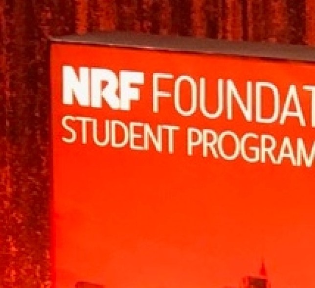NRF big show red backdrop