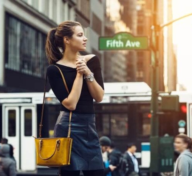 young woman standing on Fifth Avenue