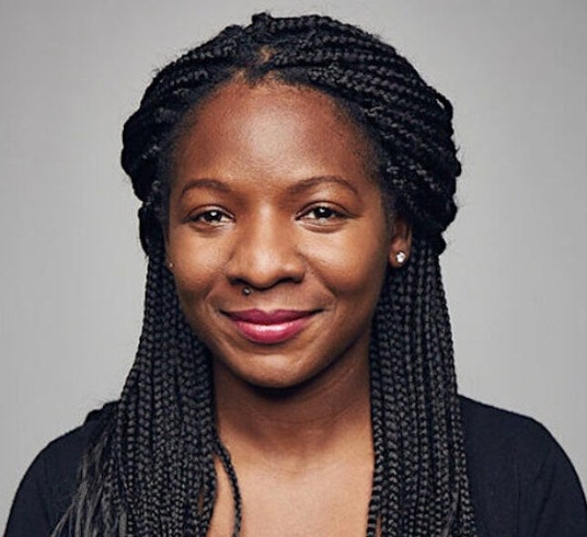 woman, long dark hair, black shirt, professional headshot
