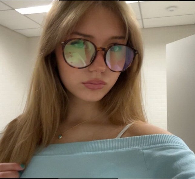 young woman, long blonde hair, glasses, closeup
