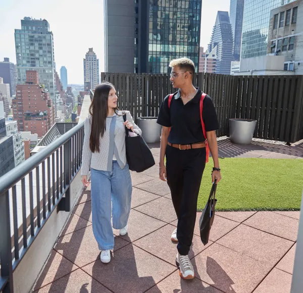 2 people on roof of FOUND Study