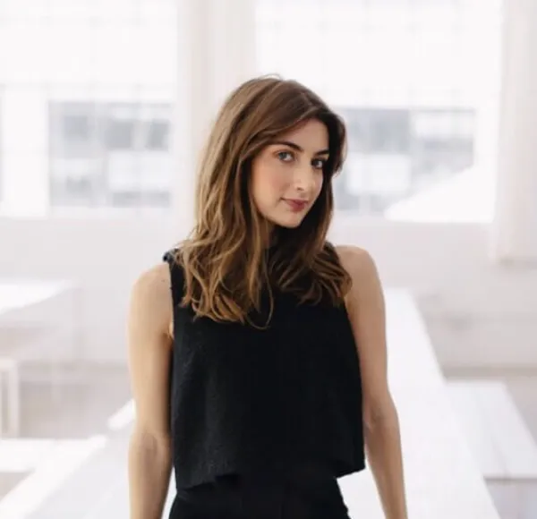 Lauren Gallo leaning on white table