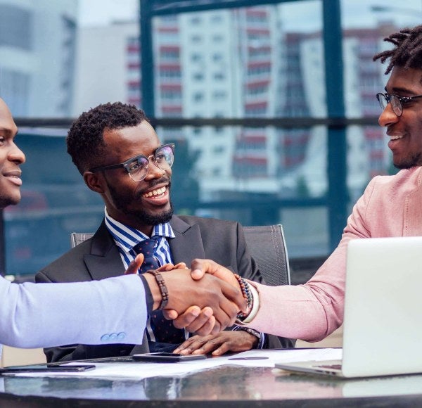 Three men in a meeting