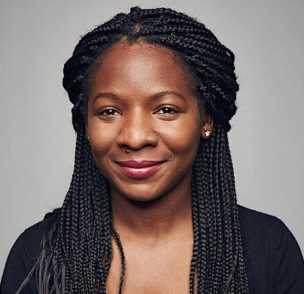 woman, long dark hair, black shirt, professional headshot