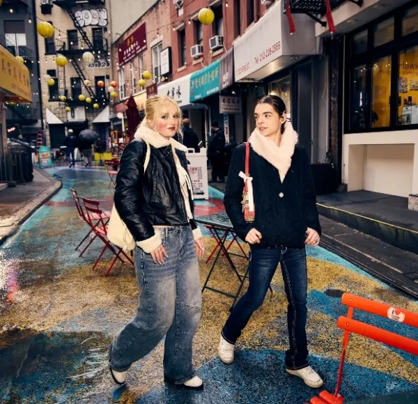 two students walk in Chinatown, NYC