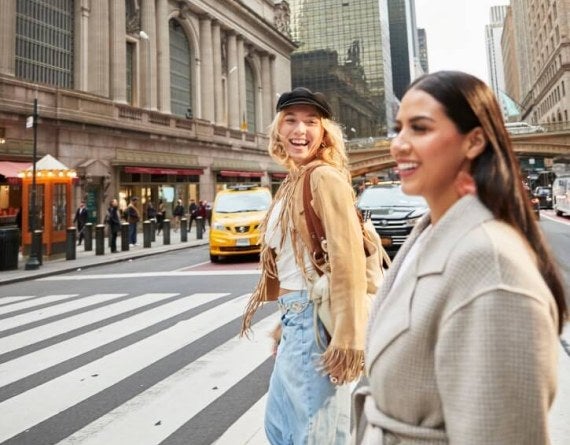 students crossing street midtown, Chrysler Building in background