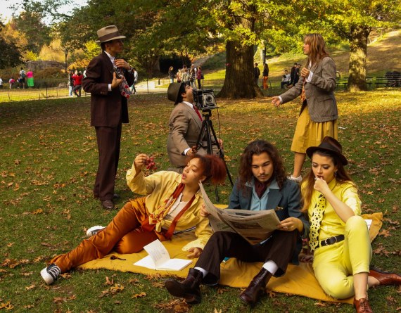 group of students in old time clothes in park