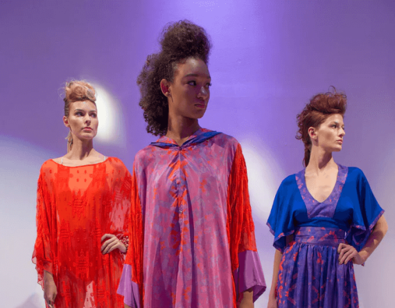 three models in dresses