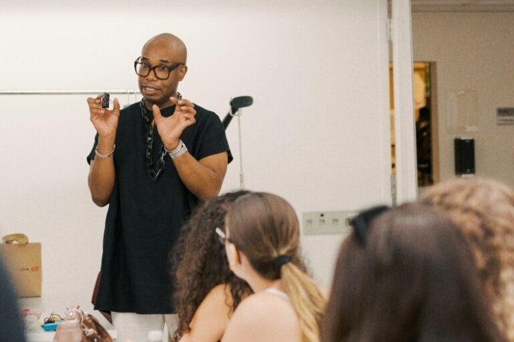 Professor Spence teaching Fashion Academy Class