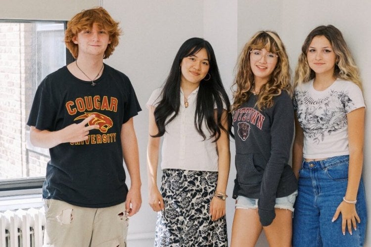 Fashion Academy student group together in FashionOpolis classroom