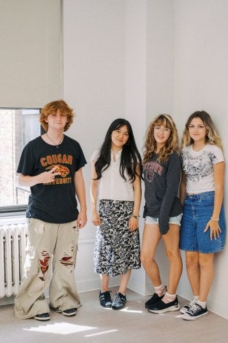 Fashion Academy student group together in FashionOpolis classroom