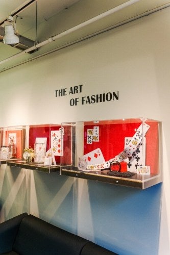 Visual Studies display, oversized playing cards in lightboxes