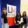 student mentors at open house with LIM logo flag