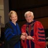 Elyce Arons and President Marshall on 2026 Commencement stage, academic regalia