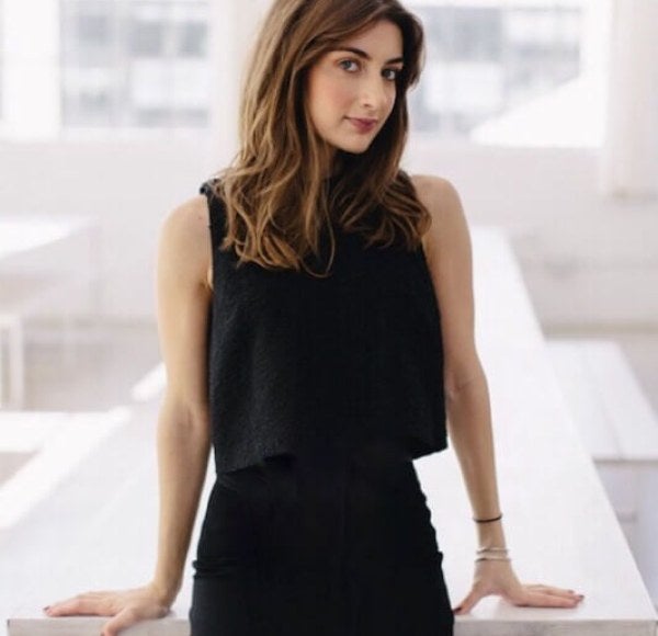 Lauren Gallo leaning on white table